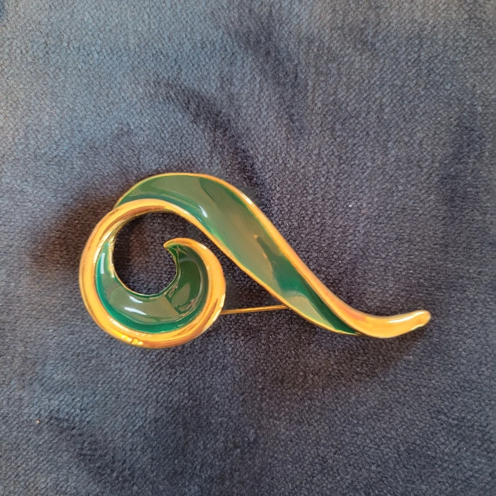 Trifari trio brooches